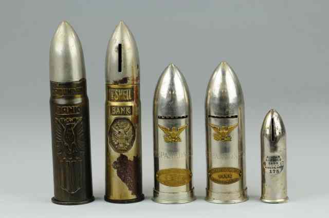 Appraisal: GROUPING OF SHELL STILL BANKS Includes five shell casing figural