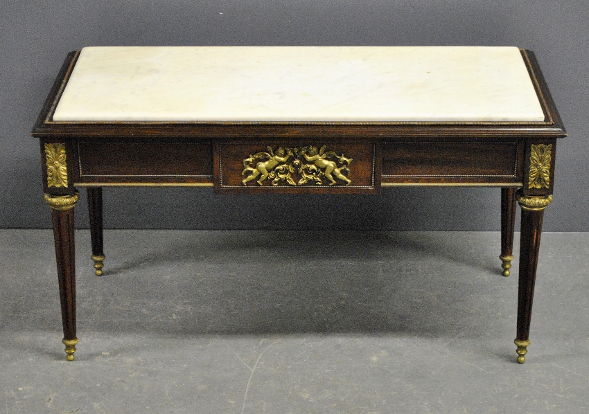 Appraisal: - French style marble top mahogany coffee table with bronze