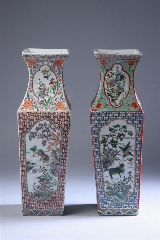 Appraisal: NEAR PAIR CHINESE FAMILLE ROSE PORCELAIN CLUB VASES Floral decoration