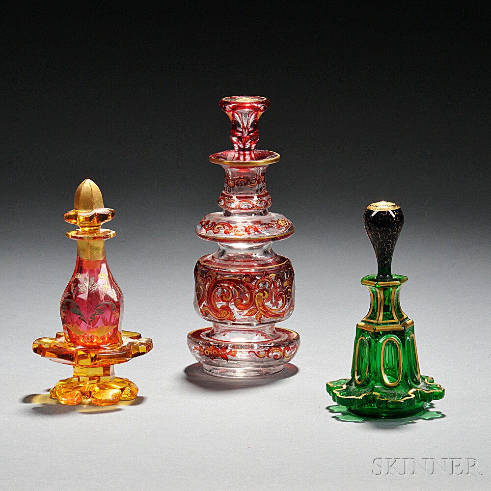 Appraisal: Three Gilded Glass Perfumes late th century all lacking factory