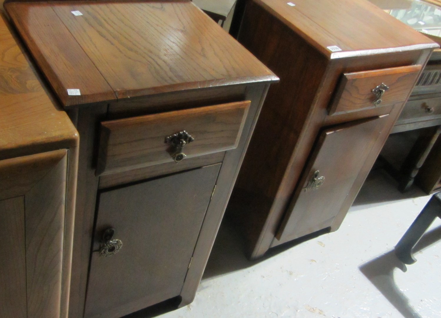 Appraisal: A pair of th century oak bedside chests