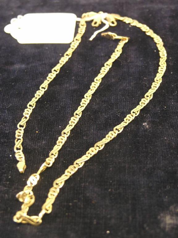 Appraisal: A long ct gold chain and matching bracelet grams total