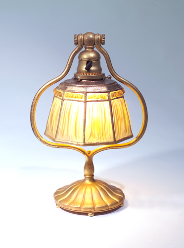 Appraisal: TIFFANY STUDIOS Small table lamp with a faceted Linenfold glass