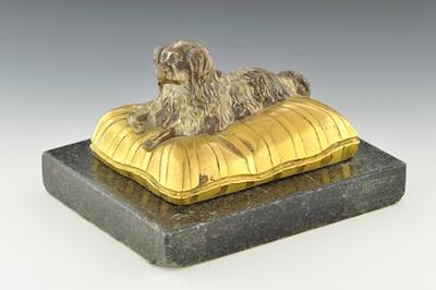 Appraisal: A Continental Bronze Miniature King Charles Spaniel on a Cushion