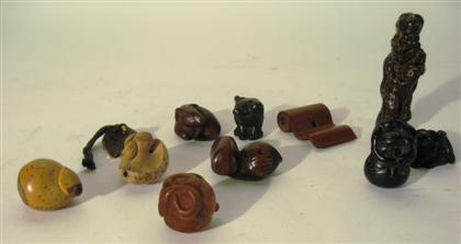 Appraisal: Collection of ten Japanese netsukeComprising examples carved from boxwood ebony