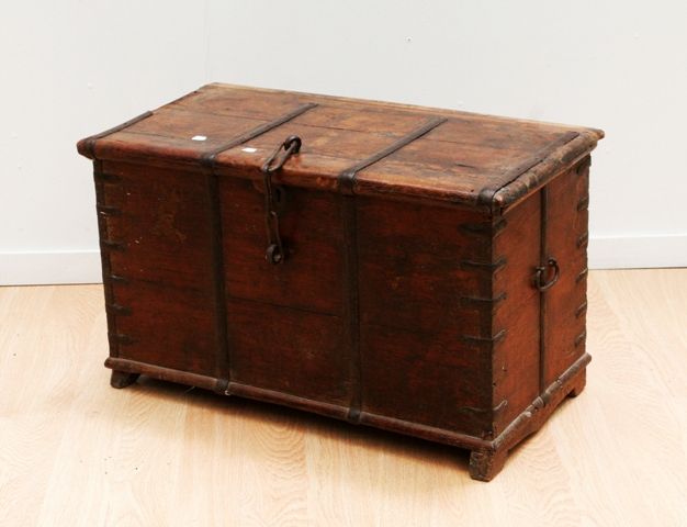 Appraisal: An iron bound storage chest top opening with an iron