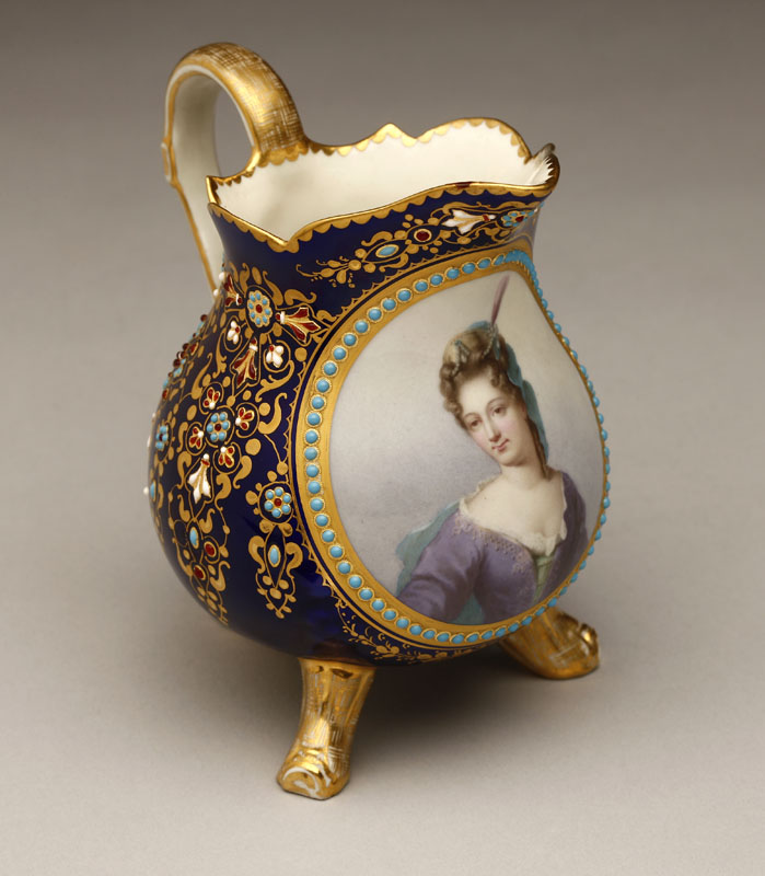 Appraisal: A Sevres style 'jeweled' porcelain cream pitcher A Sevres style