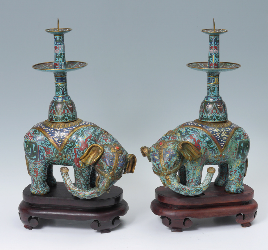 Appraisal: PAIR OF CHINESE CLOISONNE ELEPHANT CANDLE STANDS Mirror image matched