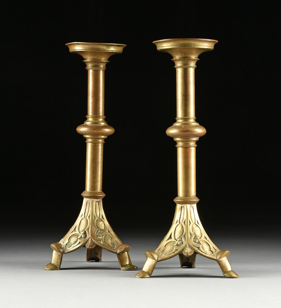 Appraisal: A PAIR OF NEO-GOTHIC BRONZE CANDLESTICKS LATE TH EARLY TH