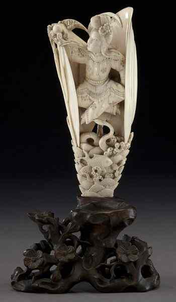 Appraisal: Chinese Qing carved ivory shell fairy International buyers should note