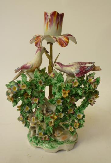 Appraisal: A BOW PORCELAIN CANDLESTICK modelled as a single tulip issuing