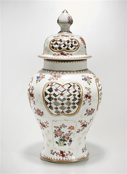 Appraisal: Chinese enameled porcelain covered vase floral motifs with openwork design