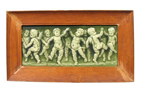 Appraisal: An earthenware relief decorated plaque depicting cherubs height in width