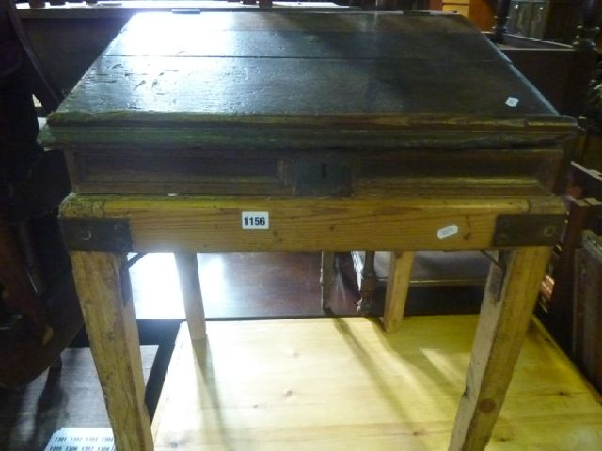 Appraisal: A rustic antique oak writing slope with hinged lid and