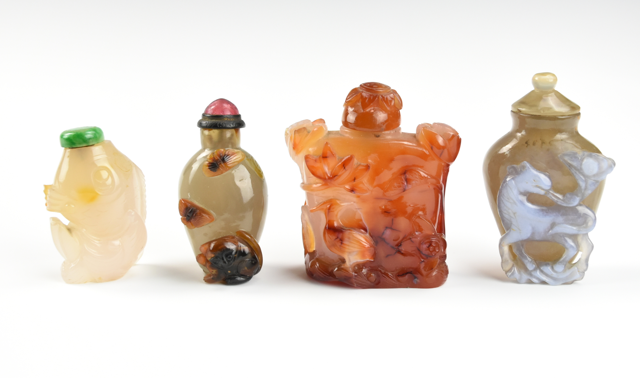 Appraisal: AGATE SNUFF BOTTLES OF FISH CRANE HORSE CAT A set