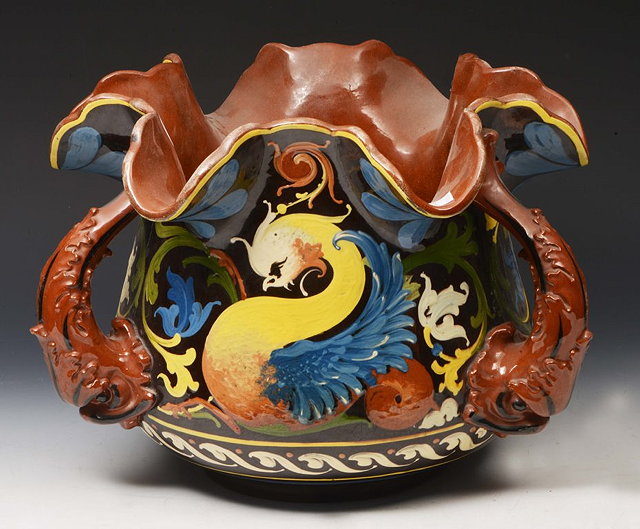 Appraisal: A LARGE LONGPARK GLAZED POTTERY JARDINIERE decorated with mythical beasts