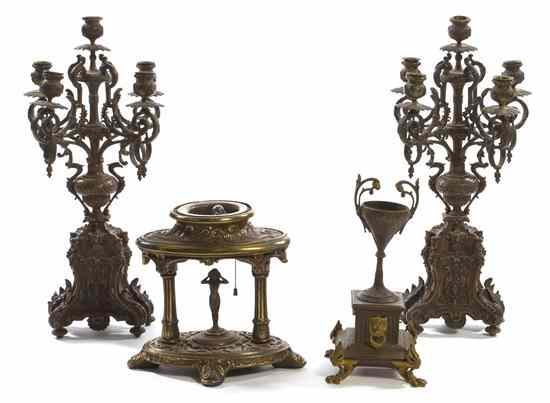 Appraisal: A Pair of Continental Bronze Five-Light Candelabra together with a