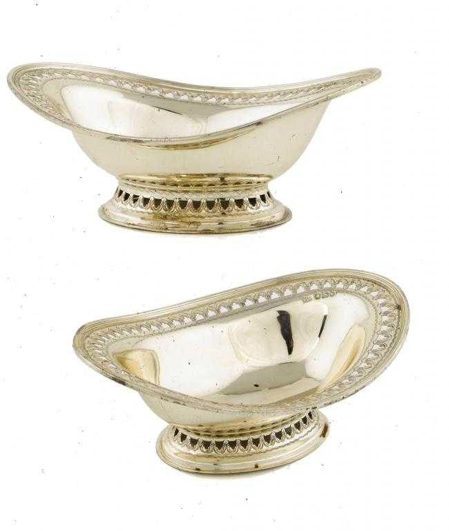 Appraisal: A PAIR OF VICTORIAN OVAL SWEETMEAT DISHES with pierced and