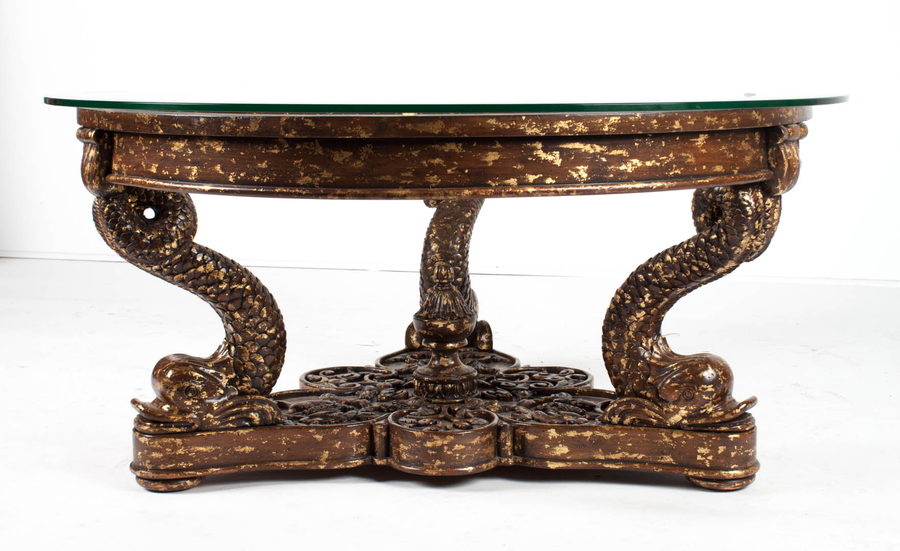 Appraisal: Regency style glass top coffee table gilt and painted carved