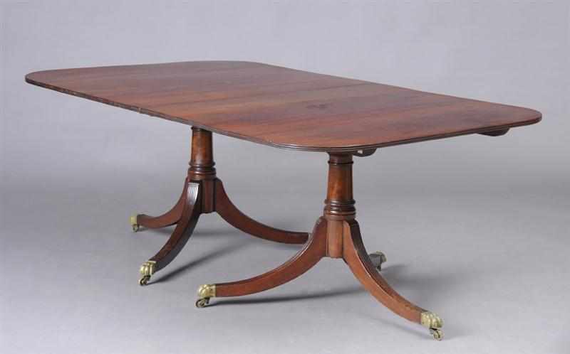 Appraisal: GEORGE III STYLE MAHOGANY TWO-PEDESTAL DINING TABLE The four-board top