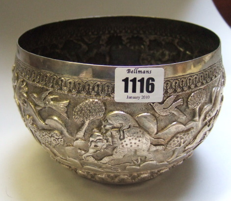 Appraisal: An Eastern bowl decorated with animals and figures in a