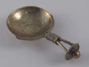 Appraisal: A modern silver caddy spoon with circular bowl and bound