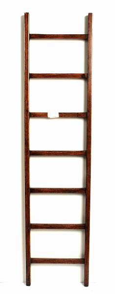 Appraisal: A mixed wood library ladder with seven treads height ft