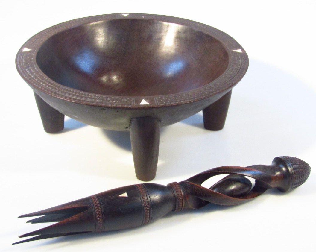 Appraisal: A hardwood South Pacific bowl with a heavily carved outline