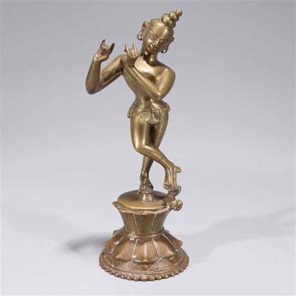 Appraisal: Antique Indian bronze and copper alloy dancing Krishna on base