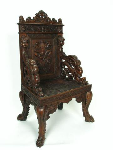 Appraisal: Ornate antique Baroque-style carved armchair Italian walnut with hand-tooled leather