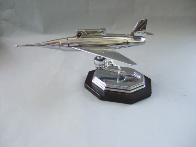 Appraisal: A Ronson silver plated table lighter modelled as a fighter