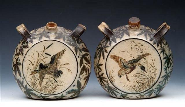 Appraisal: A PAIR OF MARTIN BROS STONEWARE PILGRIM FLASKS each with