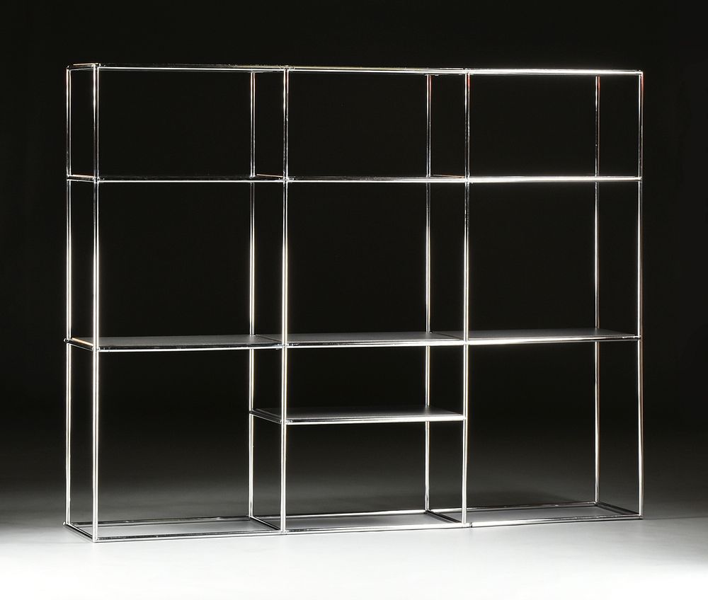 Appraisal: A CONTEMPORARY THREE SECTION CHROMED STEEL BOOK DISPLAY SHELVING UNIT