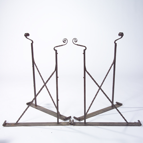 Appraisal: Four monumental wrought-iron lantern brackets Each with spiral support and