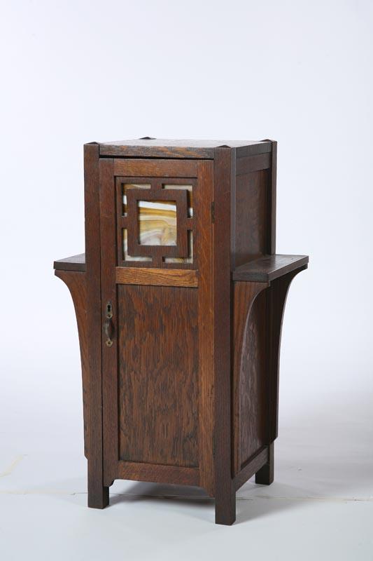 Appraisal: ARTS AND CRAFTS SMOKING STAND American late th-early th century