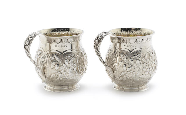 Appraisal: A pair of George IV silver mugs probably by William