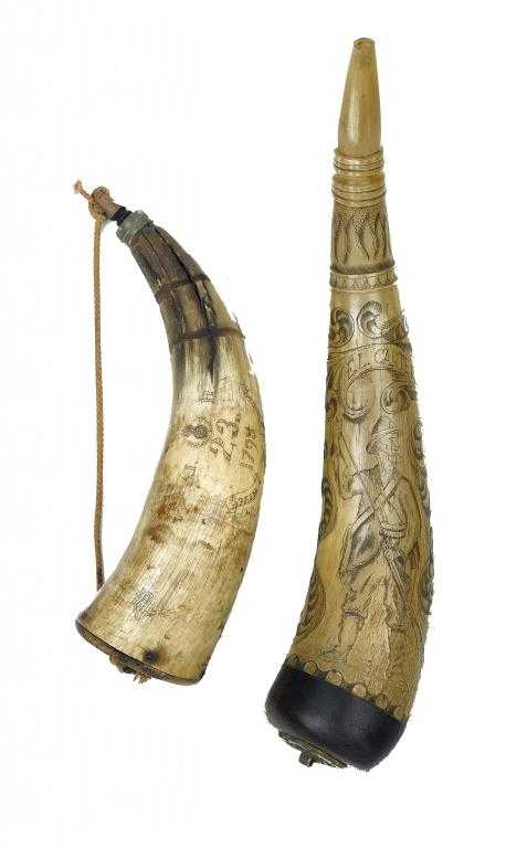 Appraisal: TWO COW HORNS one boldly incised with a man loading