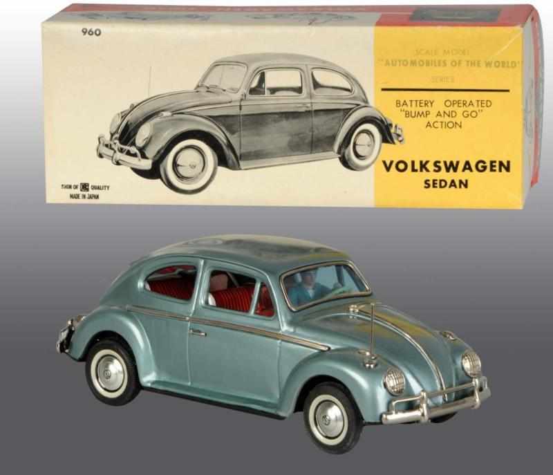 Appraisal: Tin Volkswagen Sedan Car Battery-Op Toy Description Japanese Working When