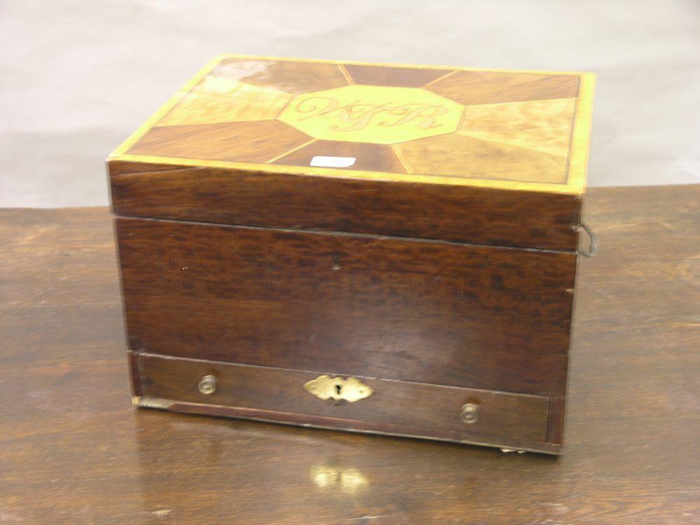 Appraisal: An inlaid mahogany box with flush fitting carrying handles and