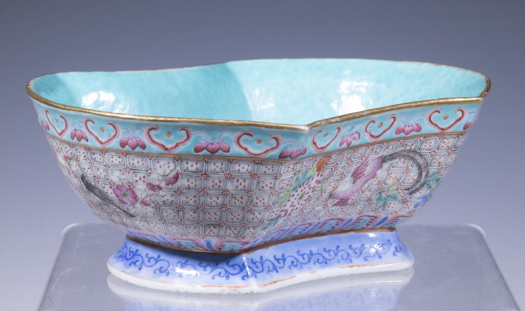 Appraisal: CHINESE PORCELAIN INGOT SHAPED BIRDS BOWL th c Famille Rose