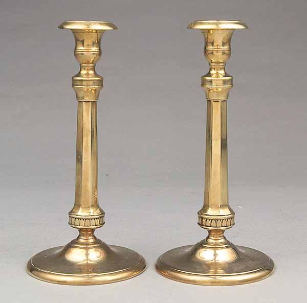 Appraisal: A Pair of Antique French Highly-Polished Brass Candlesticks having circular