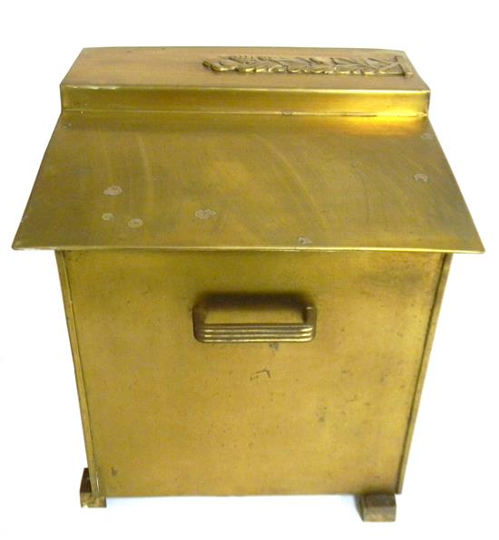 Appraisal: Art Deco coal scuttle raised on four block feet brass