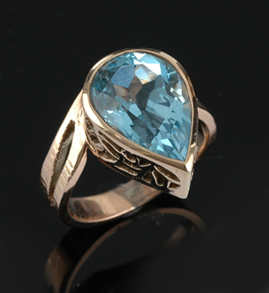 Appraisal: A Topaz dress ring The pear cut topaz weighing cts