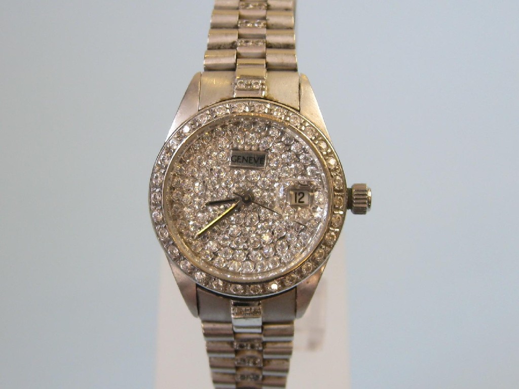 Appraisal: A Lady's cocktail Watch the silvered dial pav -set numerous