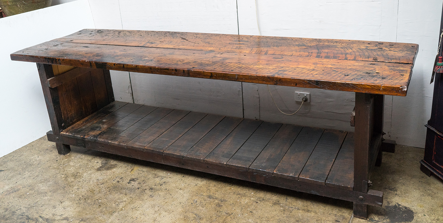 Appraisal: A MID CENTURY TWO TIER INDUSTRIAL WORKBENCH Provenance salvaged from