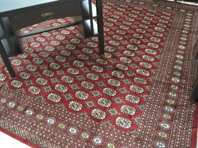 Appraisal: PAKISTANI BOKHARA CARPET repeating columns of Turkoman gols in two