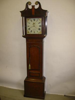 Appraisal: A LONGCASE CLOCK by Houghton Uppingham the hour movement with