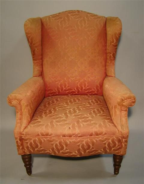 Appraisal: GEORGE III REGENCY STYLE MAHOGANY WING CHAIR the pink upholstered