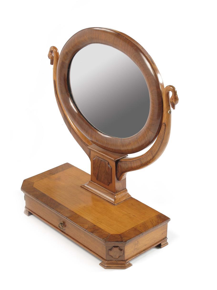 Appraisal: A th century Biedermeier walnut and fruitwood toilet mirror