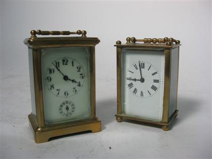 Appraisal: Two brass and glass carriage clocks th century Typical designs